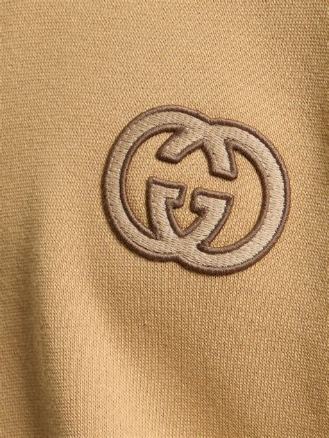 gucci felted cotton jersey hoodie with gucci vintage logo|gucci hoodie reflective.